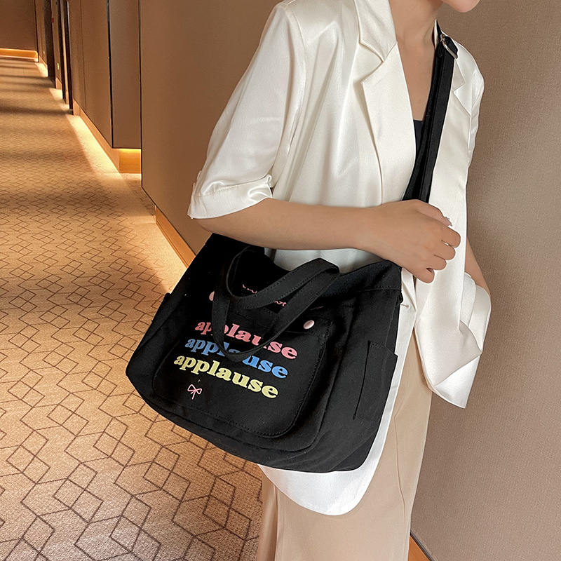 大容量字母帆布包女2024春夏新款简约休闲上课通勤单肩