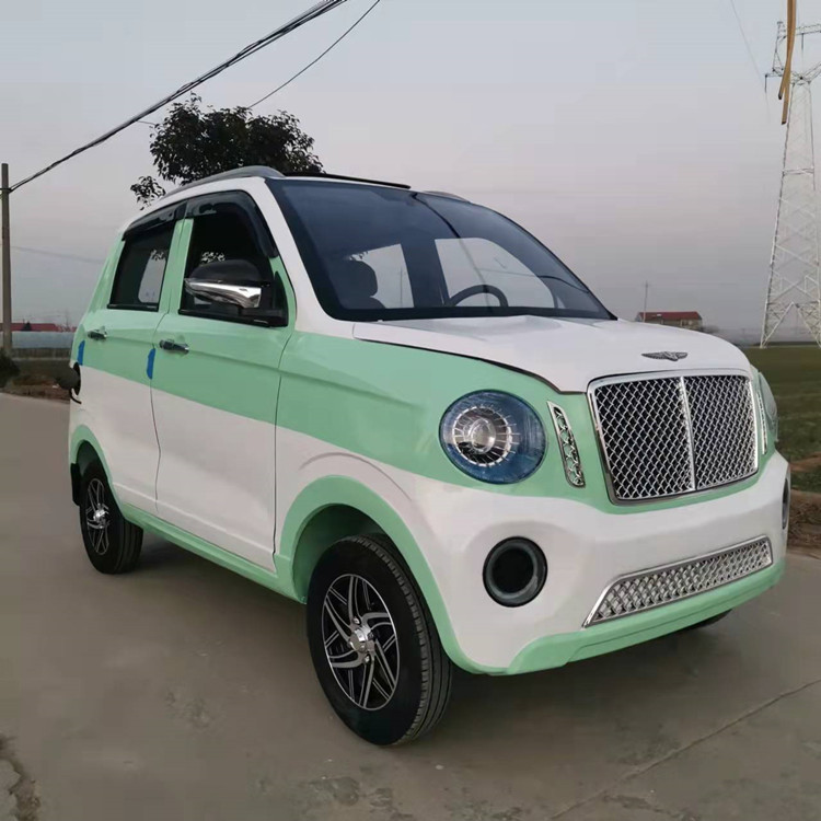 新款电动四轮车油电两用老年家用电瓶车全封闭接送孩子上下班代步