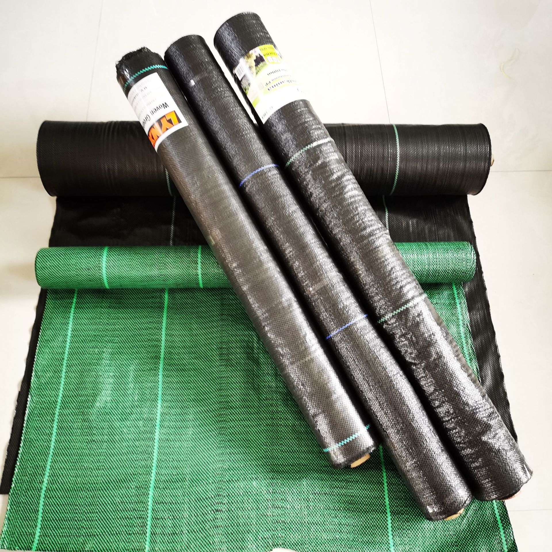 新料pp防草布 农用地布渗水防草布 透气保湿园艺防草膜除草地布