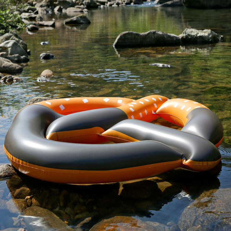 义乌工厂现货充气玩具批发水上游泳面包圈pvc成人水浮浮排 充气床