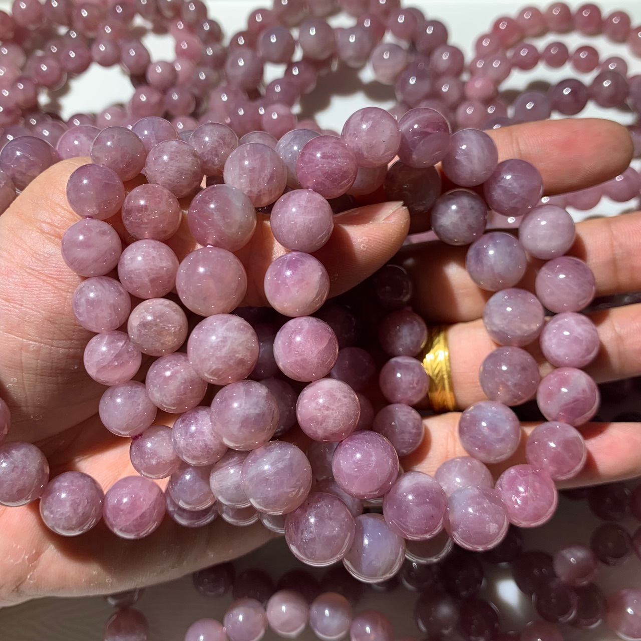 马达加斯加天然紫马粉圆珠单圈手串 老矿紫粉水晶手链批发-阿里巴巴