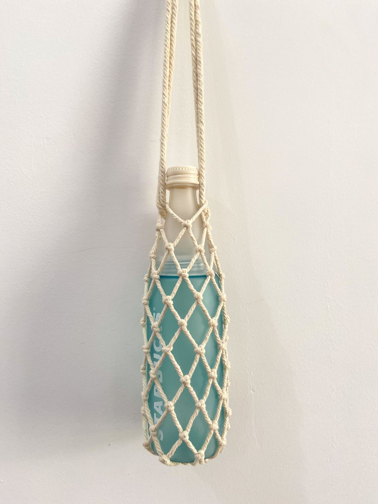 亚马逊跨境网兜斜跨装奶茶杯套纯手工编织男女通用水壶套水杯套