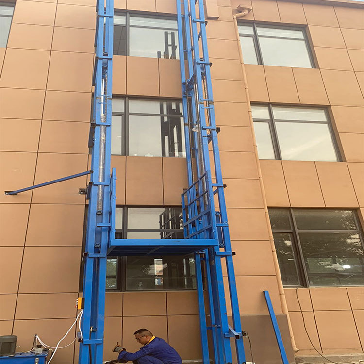 烟台市液压升降机厂家定制各种型号室外导轨式升降机外墙液压货梯
