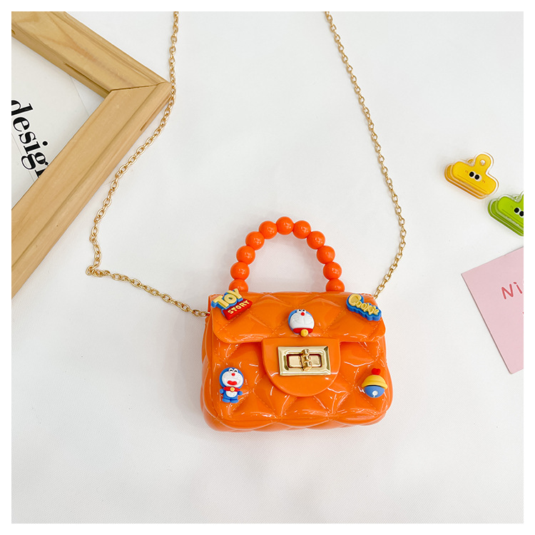 新款潮流糖果色珍珠手提包迷你可爱清新斜跨口红包透明儿童果冻包