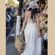 白色吊带连衣裙子女夏季2024新款茶歇法式仙女海边度假风气质长裙