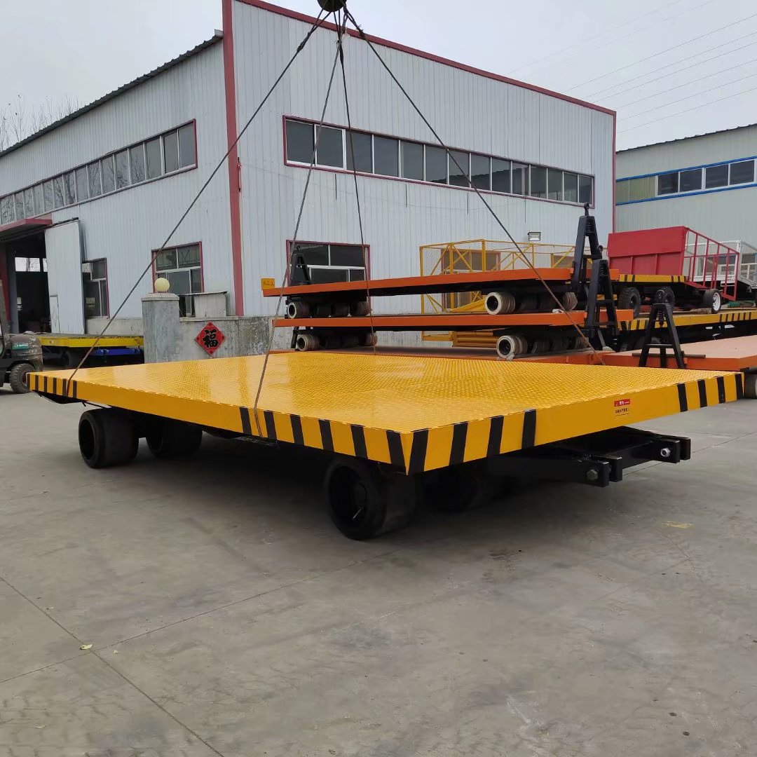 定做厂区重型货物装卸车 电动牵引式平板车 载重8吨6吨平板拖车台