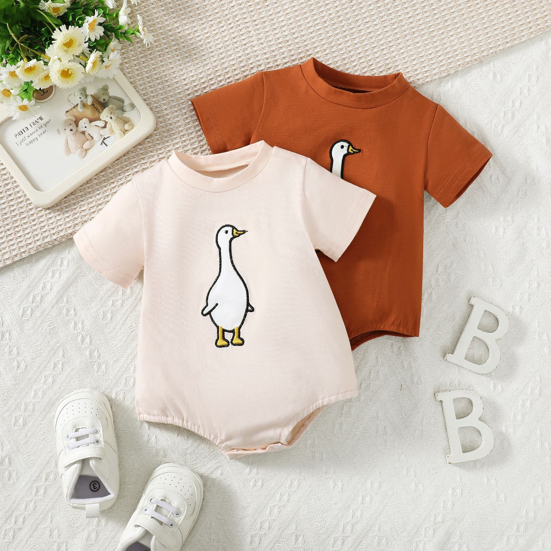 e2326a跨境款婴幼儿衣服中性夏季纯色可爱吉祥小鸭子短袖哈衣