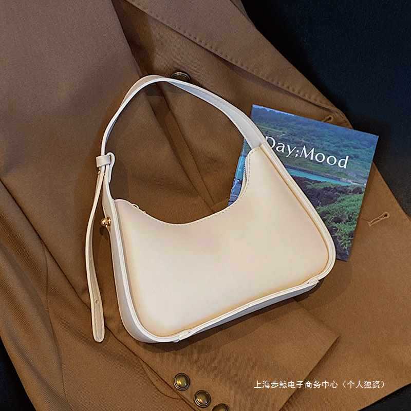 高级感小众包包女2023新款夏天百搭法式手提白色单肩包法棍腋下包