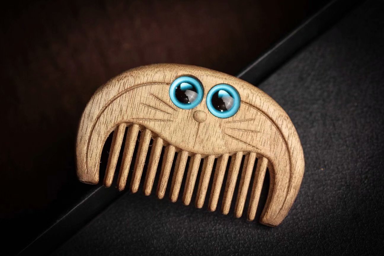 金丝楠木猫咪梳子木雕刻可爱猫咪木梳口袋梳带流苏小猫头直播货源