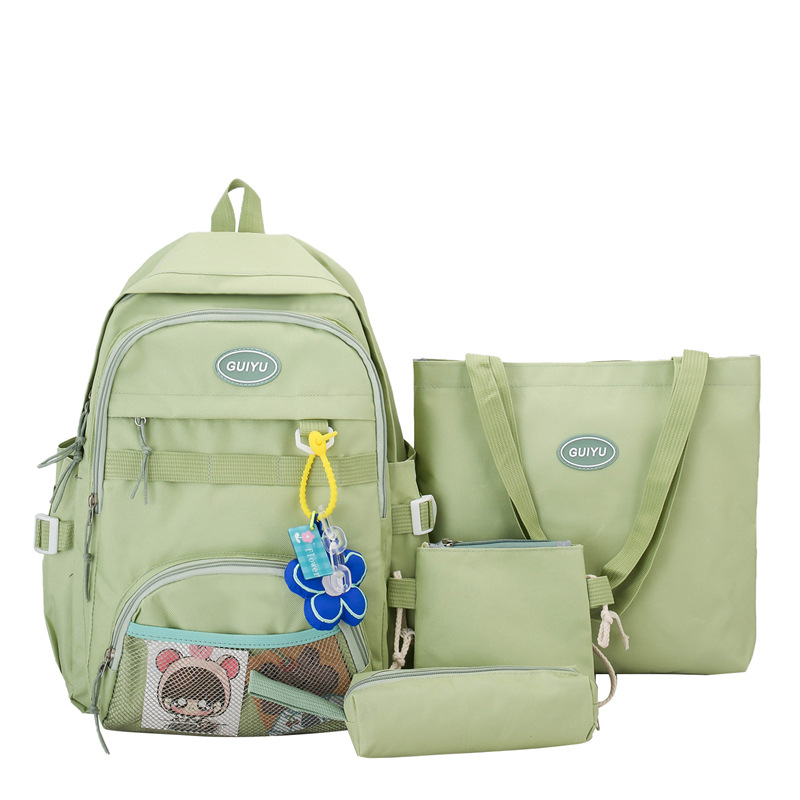 Factory Wholesale Fashion Backpack Qiyu Primary School Student Schoolbag Four-Piece Fashion Simple Leisure Bag