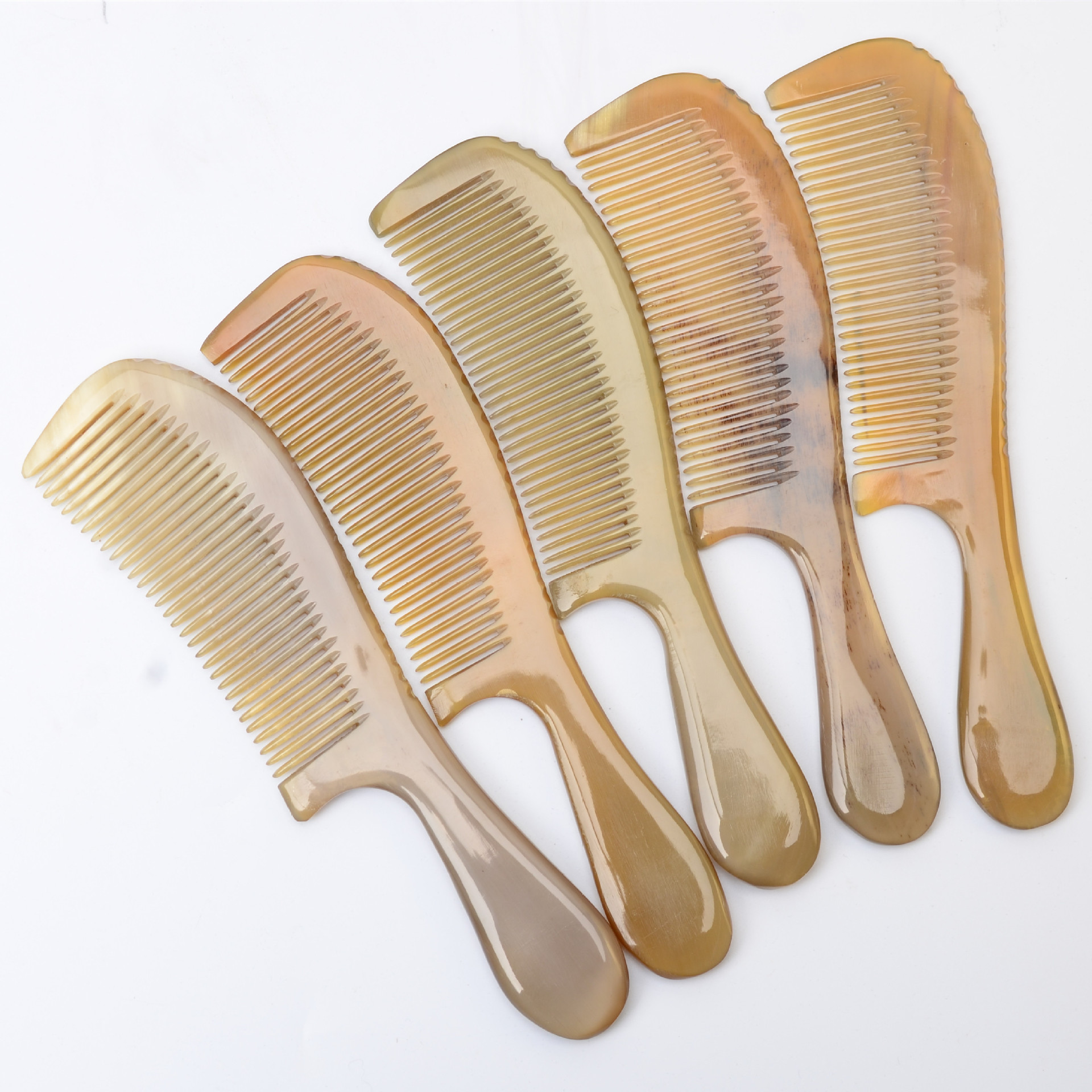 19-20厘米黄牛角鼓柄梳子 厚宽牦牛角梳子雕花天然牛角梳批发按摩