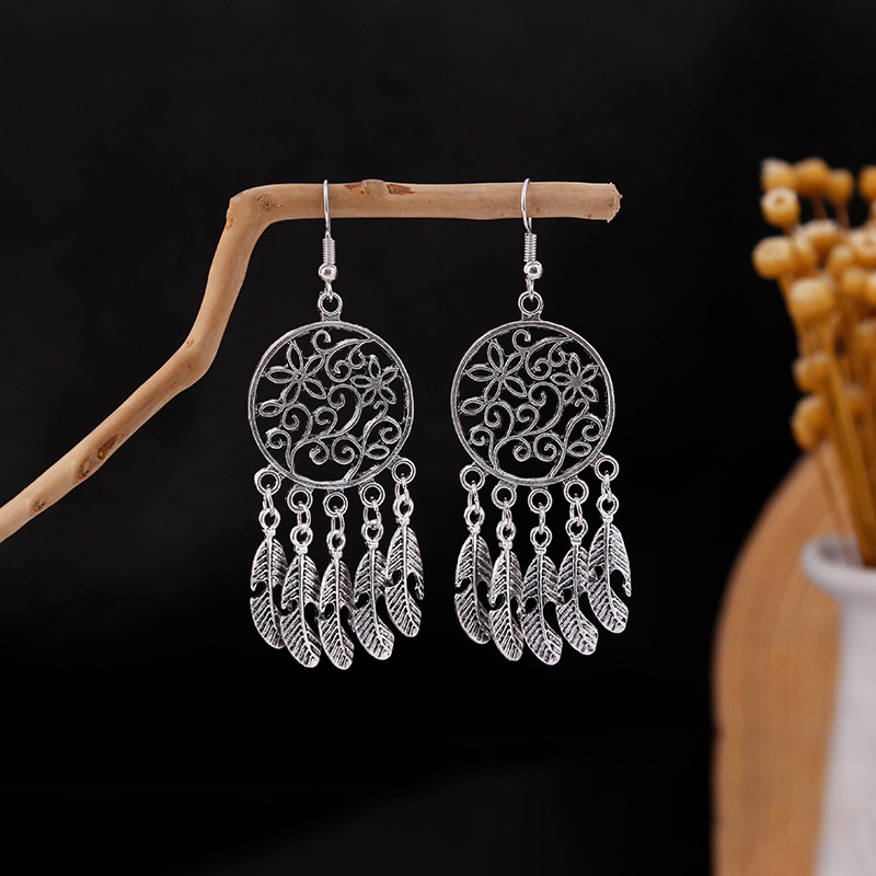 Europe and America Cross Border Earrings Retro Ethnic Style Artistic Elegant Metal Tassel Earrings Cute Doudou Ornament Wholesale