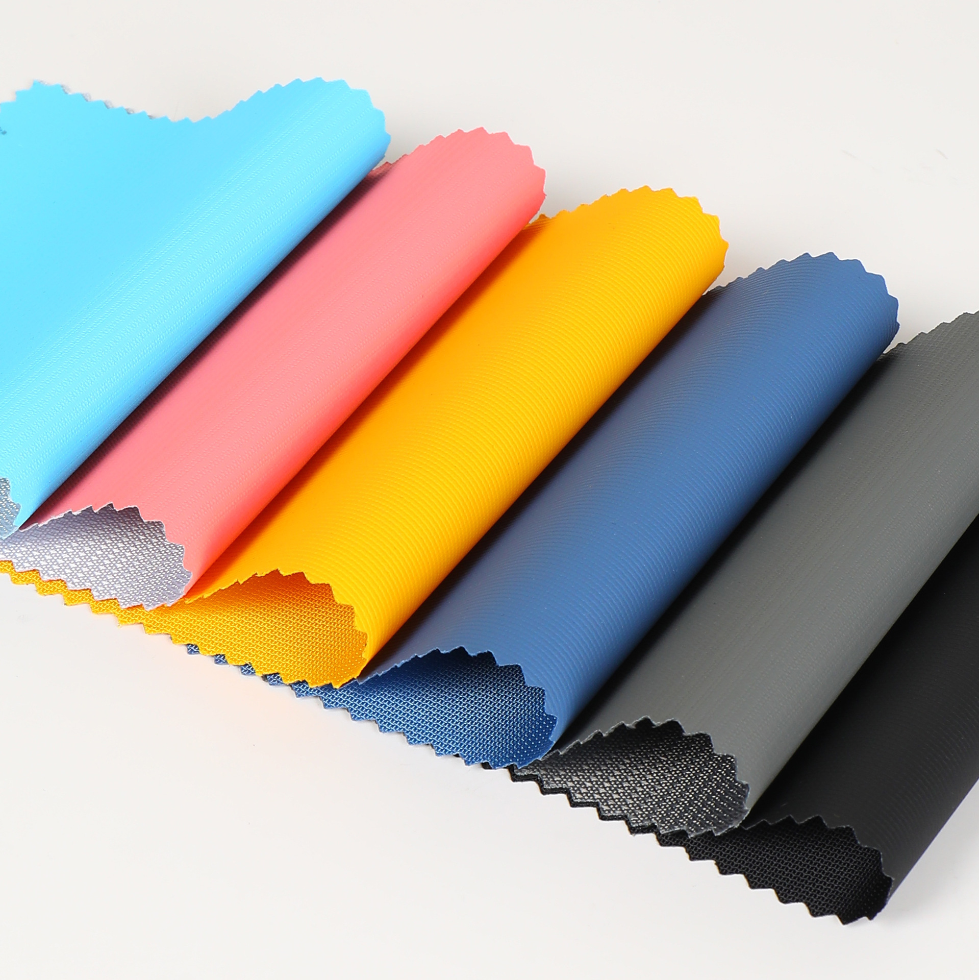 420d皮膜胶涤纶布背包手袋提花离型纸涤纶箱包面料各种pu防水布料