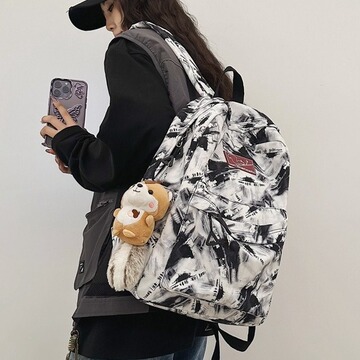 新款潮牌双肩包男ins大容量日系印花涂鸦潮酷个性中小学生双肩包