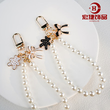 珍珠链挂件新款韩版可爱甜美蝴蝶结少女耳机包包装饰合金钥匙扣