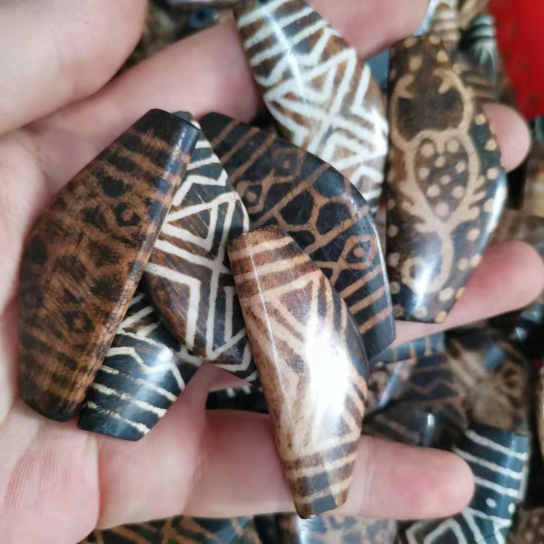 直播热推邦提克木化石牛角珠牛年吉祥弓形用于设计首饰款式长期a