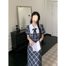 学院风格子连衣裙女夏季新款收腰显瘦设计感拼接撞色蝴蝶结长裙子