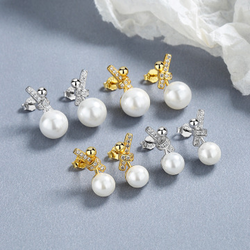 创意蝴蝶结复古珍珠耳环女925纯银个性设计小清新耳钉百搭耳饰品