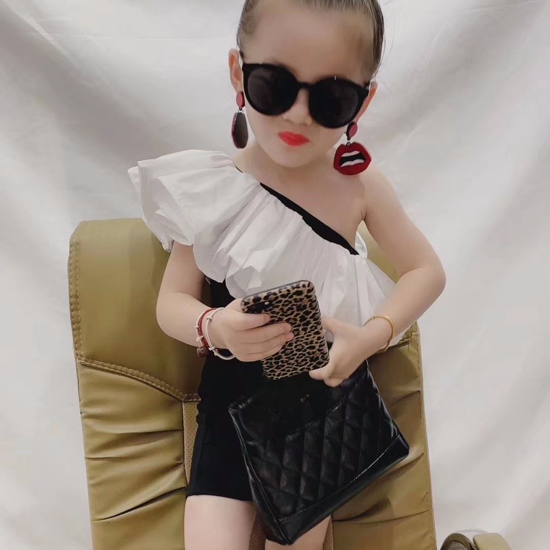 韩版夏季新款女童修身连衣裙儿童斜肩吊带弹力荷叶边包臀裙走秀潮