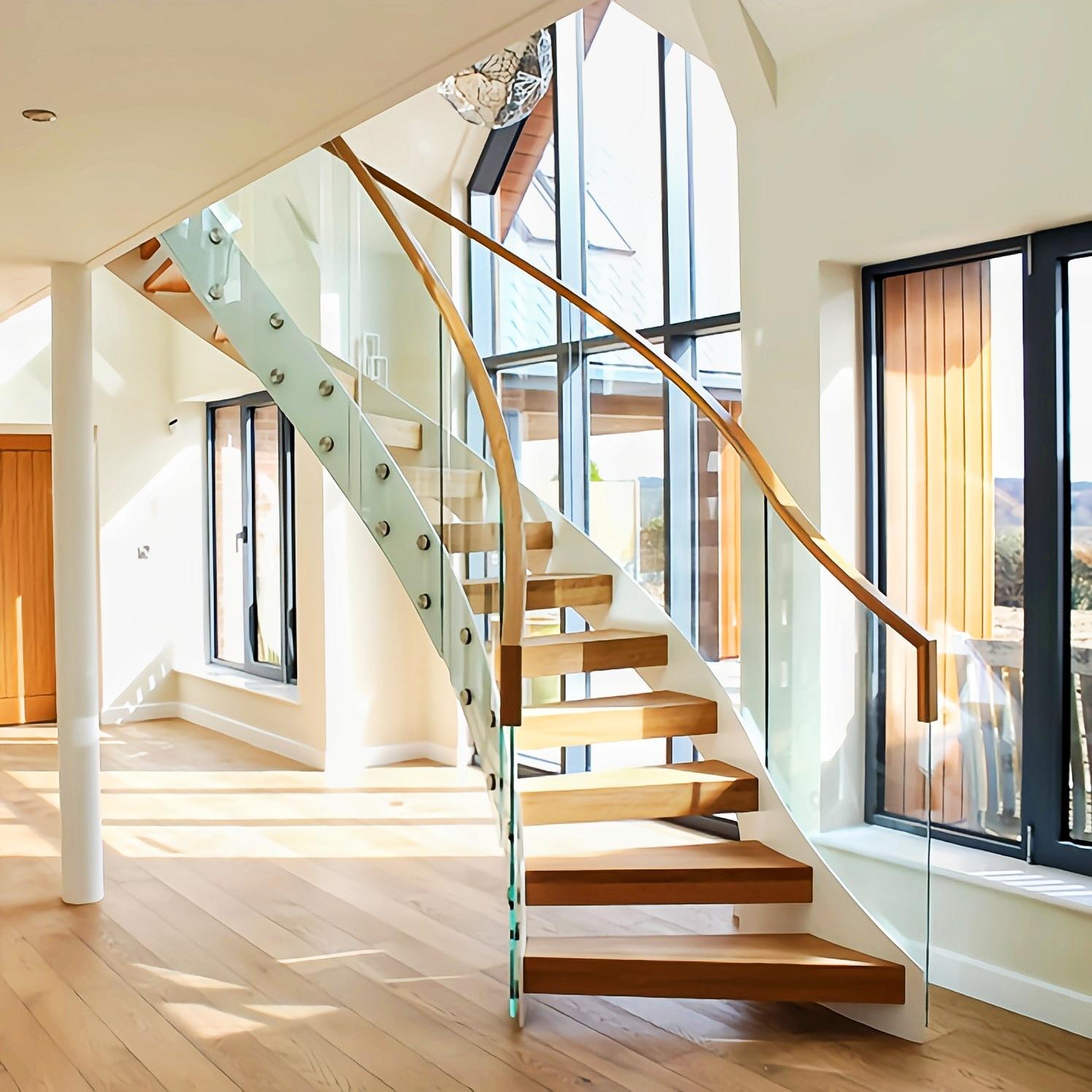 室内弧形楼梯 可定制钢结构弧形梯 木扶手木踏步玻璃弧形梯