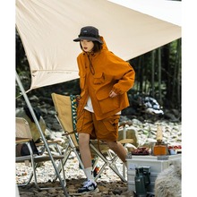 高质量秋冬季橘色户外山系多口袋机能工装连帽夹克冲锋女衣外套男