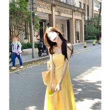 海边度假旅游泰国超好看黄色吊带连衣裙女夏温柔风收腰法式长裙子