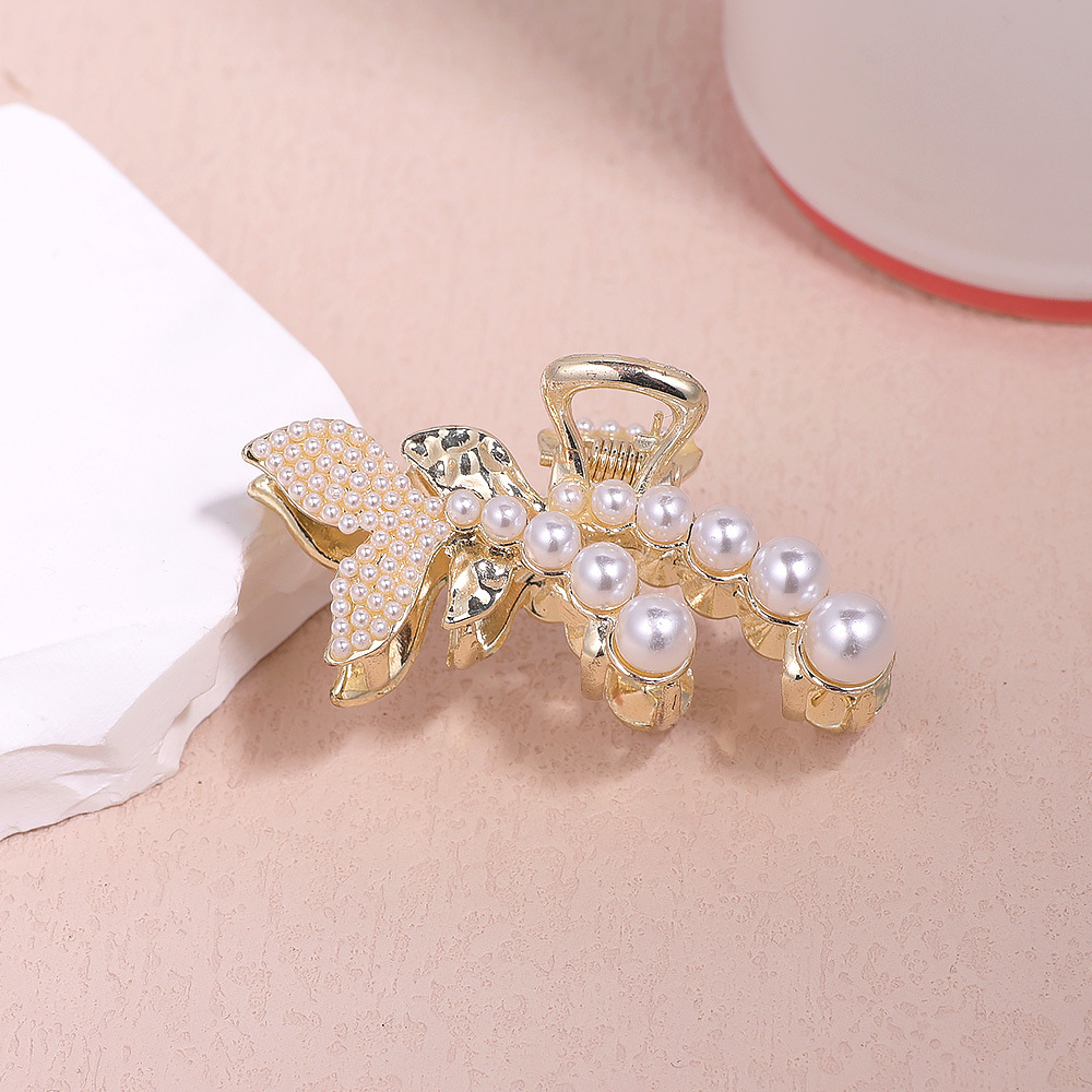 韩版珍珠抓夹头发时尚小众后脑勺半扎发鱼尾合金发夹饰品批发