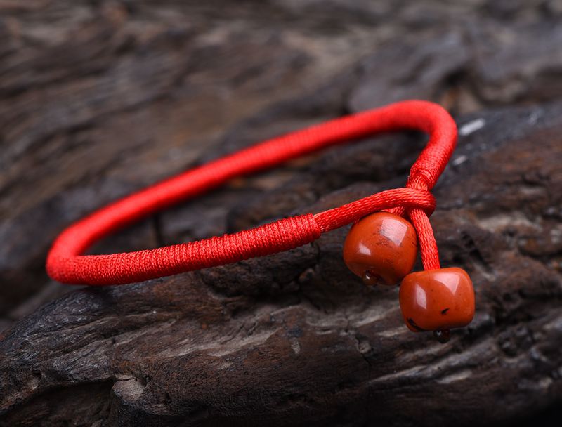 点爵珠宝 厂供5a红竹石手编红绳手链 女款红石水晶首饰手串批发