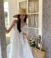 白色露背吊带连衣裙女夏季2024年新款温柔系宽松长裙法式初恋裙子
