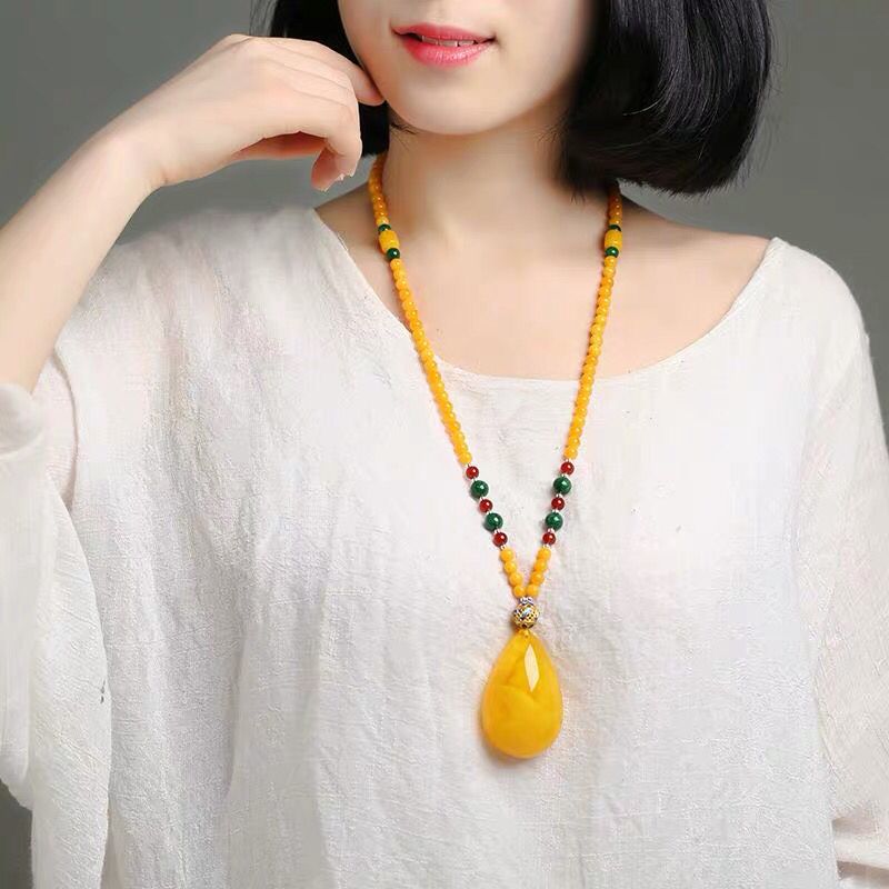 蜜蜡水滴吊坠波罗的海金绞蜜原石挂件女款百搭毛衣链琥珀项链