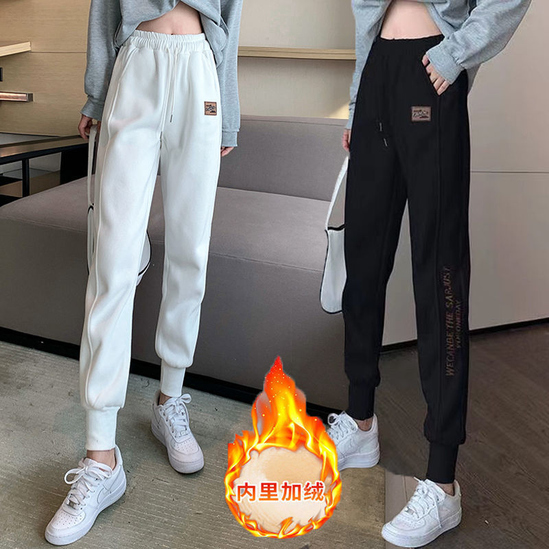 包邮裤子女冬季加绒加厚白色休闲运动束脚裤学生韩版宽松显瘦外穿