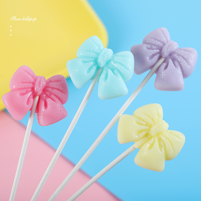 脱普糖果零食棒棒糖新年节礼物马卡龙蝴蝶结山茶花梦幻糖