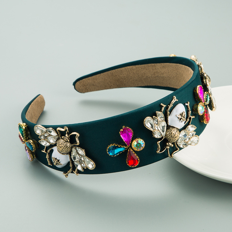 发饰产品特色:布艺,水钻产品风格:欧美产品包装:独立opp袋产品种类