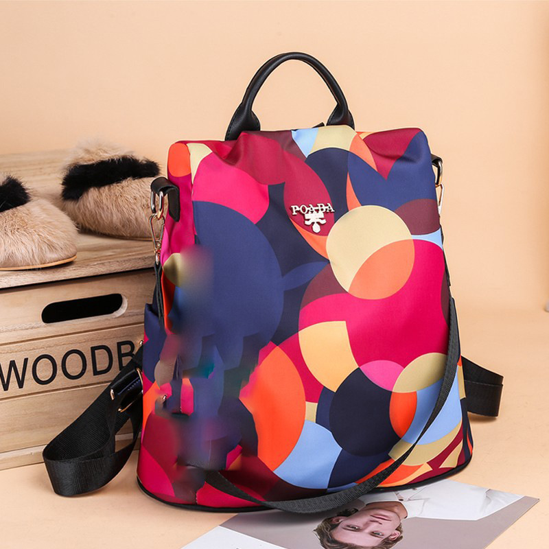 2024新款防盗背包女生户外休闲旅行包印花牛津布书包潮流双肩背包