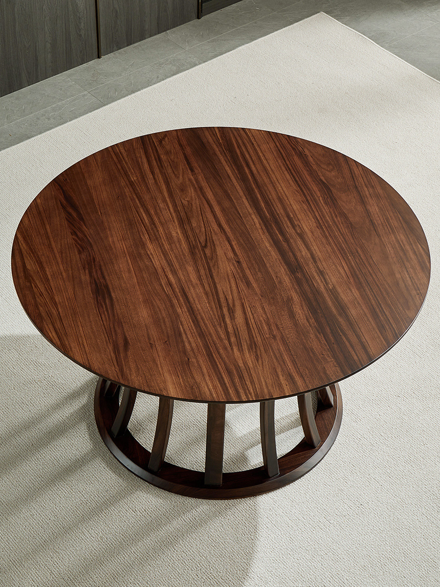 极简新中式乌金木实木餐桌椅组合家用黑胡桃原木色圆型桌子可