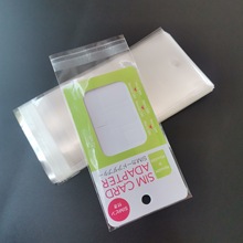 批发透明OPP自粘挂孔袋卡通钥匙链挂件袋手机卡吊孔袋印刷包装袋