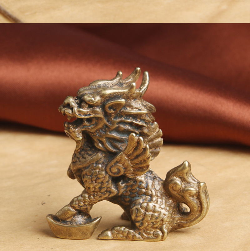 纯黄铜脚踩元宝麒麟桌面摆件招财纳福瑞兽风水摆饰老铜器文玩批发