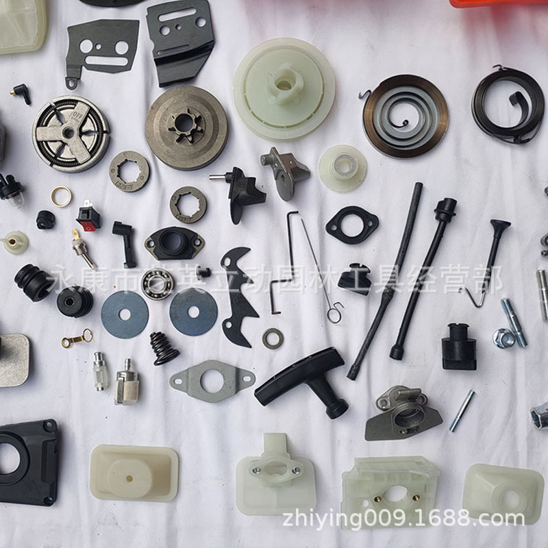 油锯配件大全通用启动器刹车板链轮化油器火花塞纸垫盘簧油锯链条