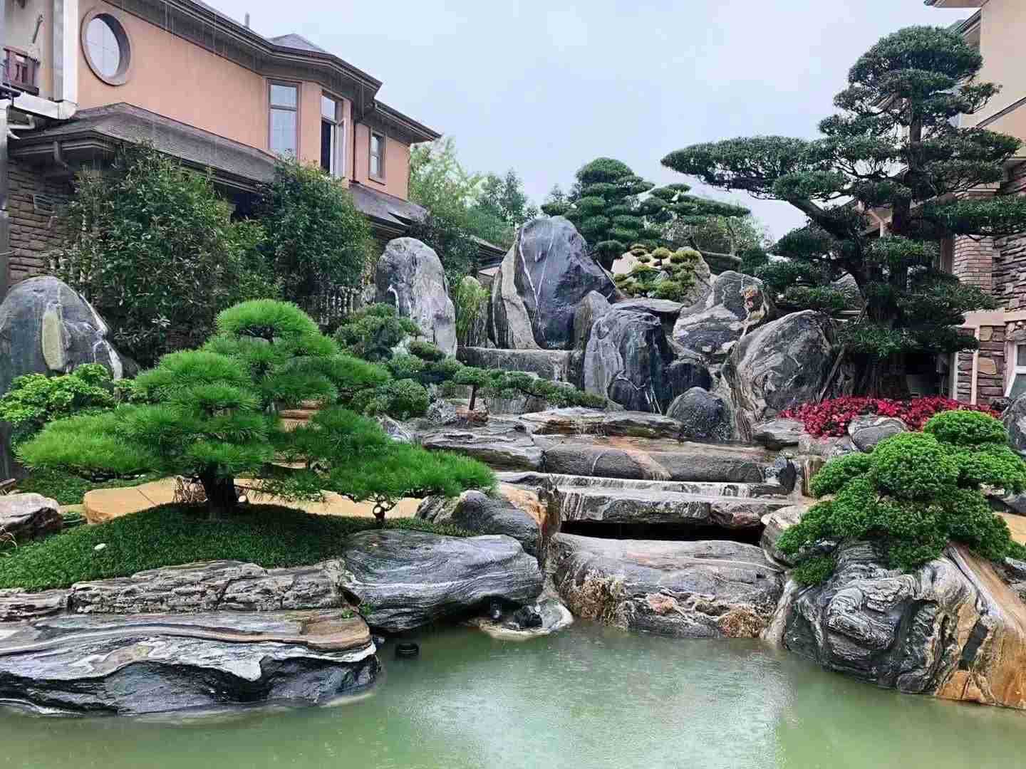 专注别墅庭院鱼池假山水系承包建造 泰山石假山 过滤池流水雾化