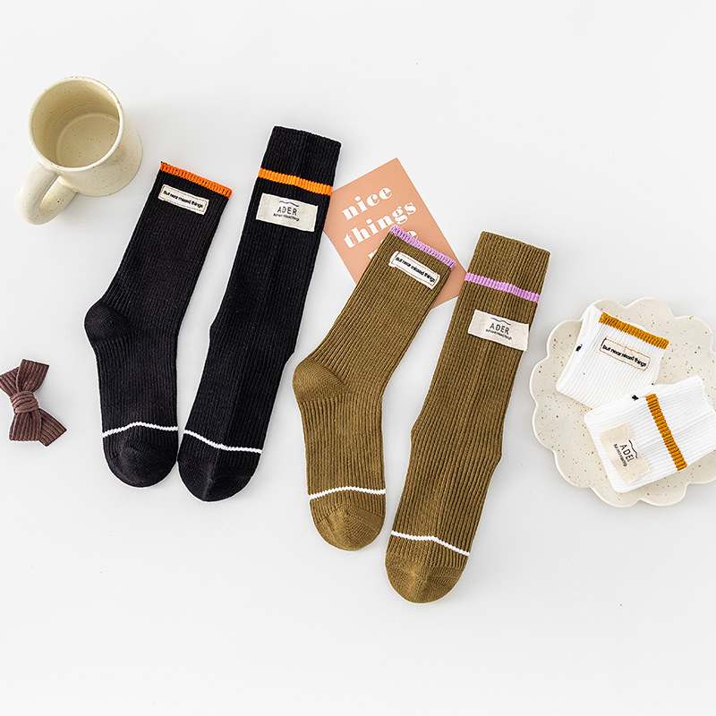 韩版潮袜子不对称双缝标长短不一时尚个性中筒袜男女情侣潮流袜
