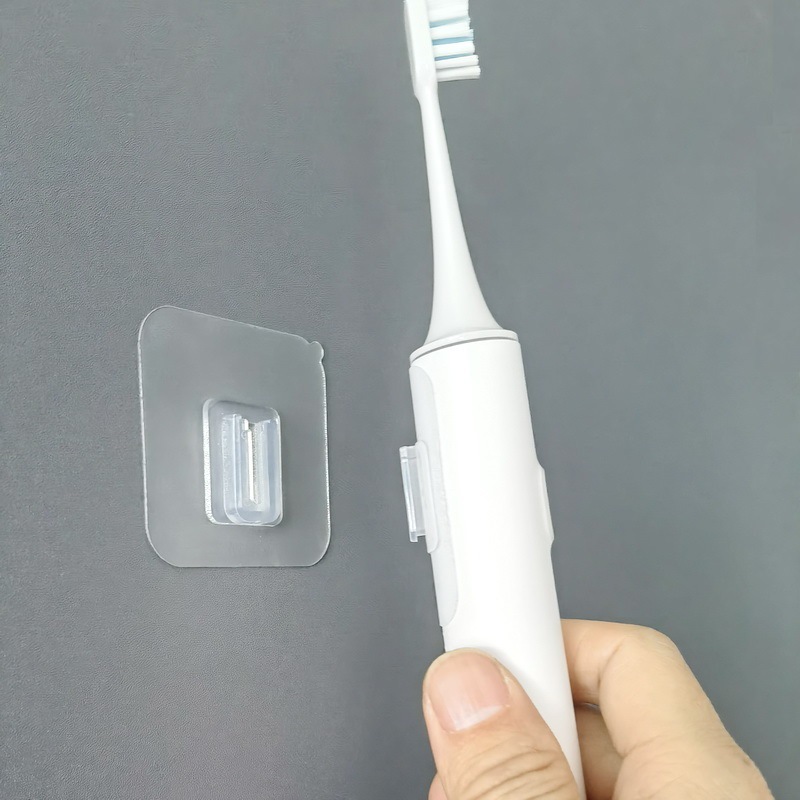无痕粘贴子母扣电动牙刷架免打孔壁挂卡扣可贴曲面挂钩排插固定器