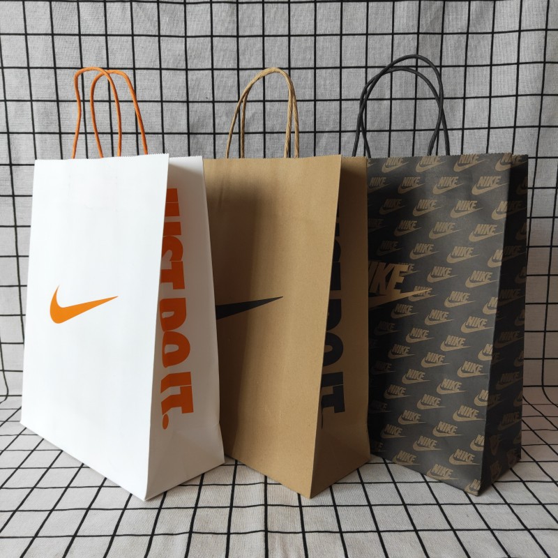 用于现货 休闲 耐克 nk 牛皮纸袋子 手提袋 服装袋 购物礼-阿里巴巴