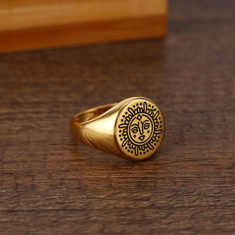 亚马逊热卖古罗马女神笑脸戒指钛钢古希腊太阳神黑金戒指