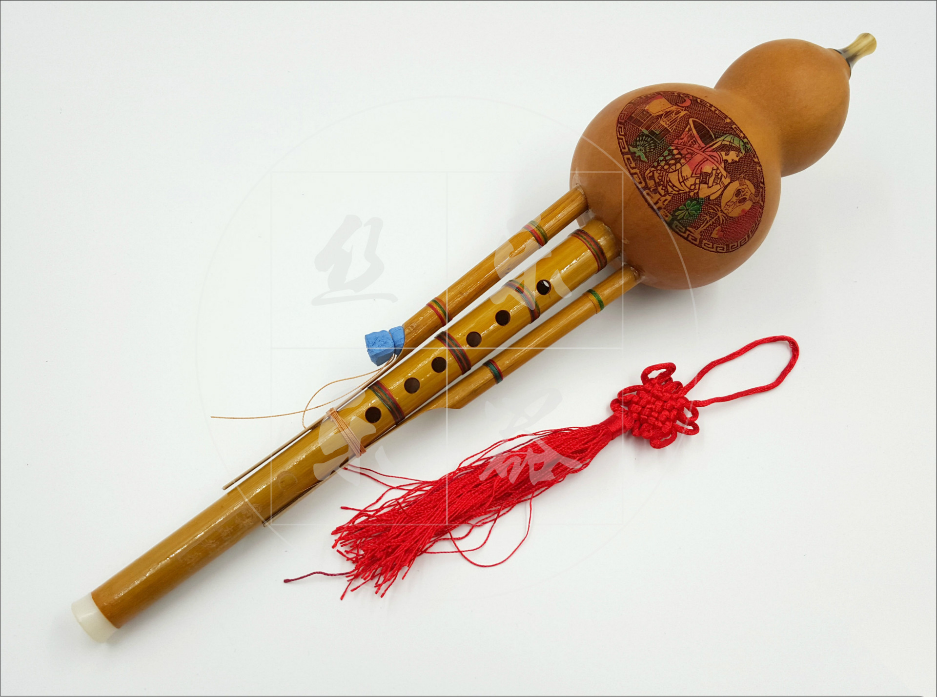 厂价直销:天然凤尾竹绑七彩线 初学双音葫芦丝降b调 c调乐器批发