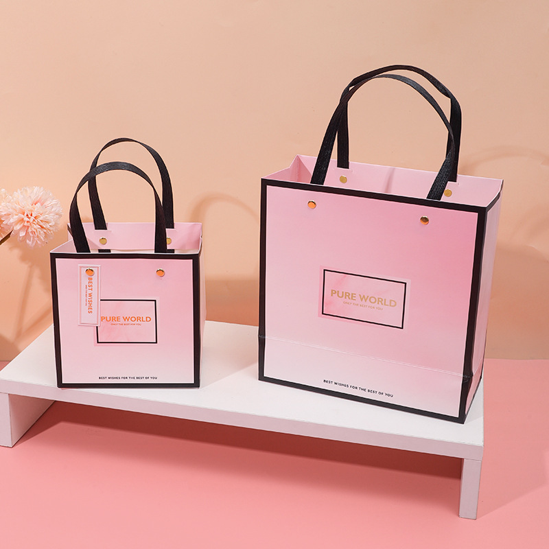 纯净世界粉色礼袋大号铆钉手提袋节日送礼鲜花娃娃收纳送礼纸袋子