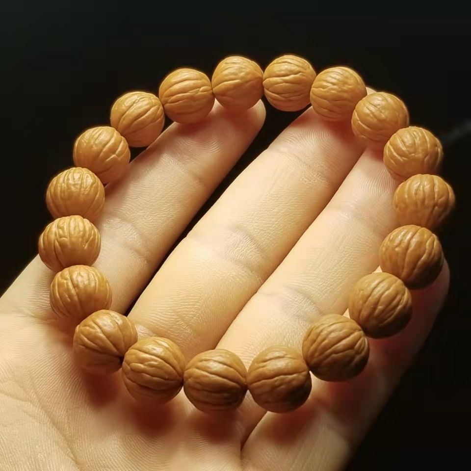 精品水晶猴头小馒头核桃金丝猴头原桩正圆浅纹老树籽文玩佛珠手串