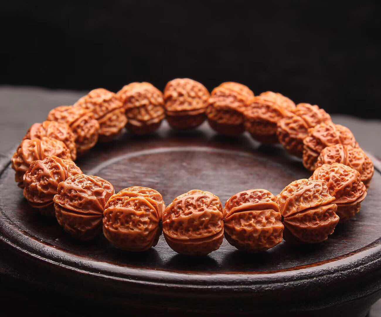 小核桃龙纹京八棱手串龙纹桃核雕刻手串正圆矮桩橘红皮文玩批发