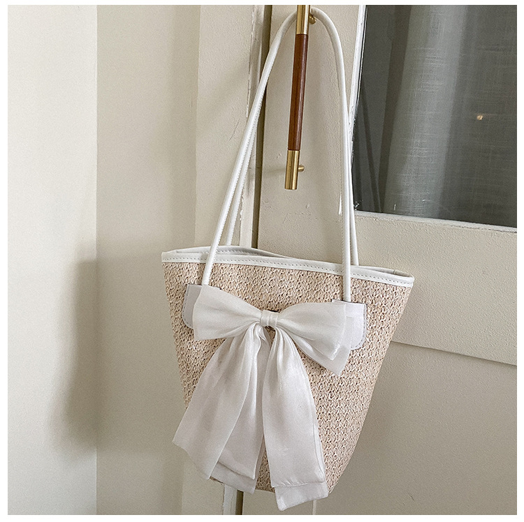 Western Style Straw Woven Bag 2022 Autumn New Bow Woven Bucket Bag Large Capacity Versatile Autumn Travel Shoulder Bag