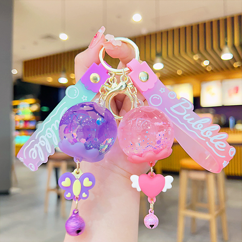 cartoon small jewelry doll cute quicksand gift acrylic oil-in pendant liquid quicksand bottle keychain wholesale