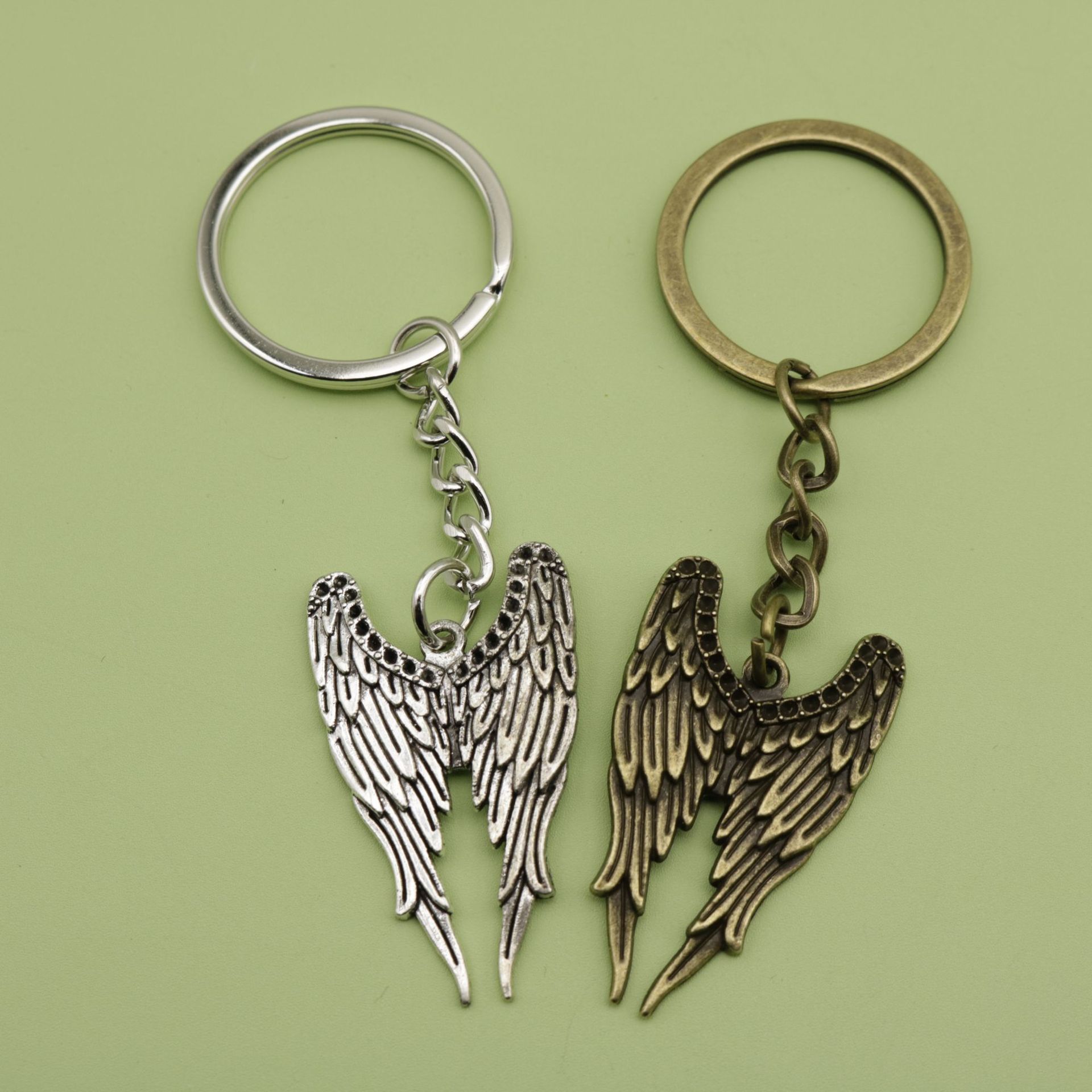 temu速卖通shein希音亚马逊外贸爆款饰品简约翅膀羽毛钥匙扣挂件